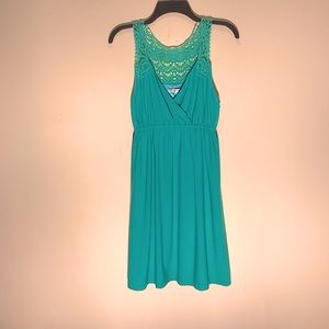 Joy Joy size small teal rayon/spandex dress with beautiful crochet trim. AG